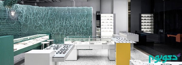 طراحی داخلی فروشگاه عینک با ایده دیوارهایی از سیم های بافته شده